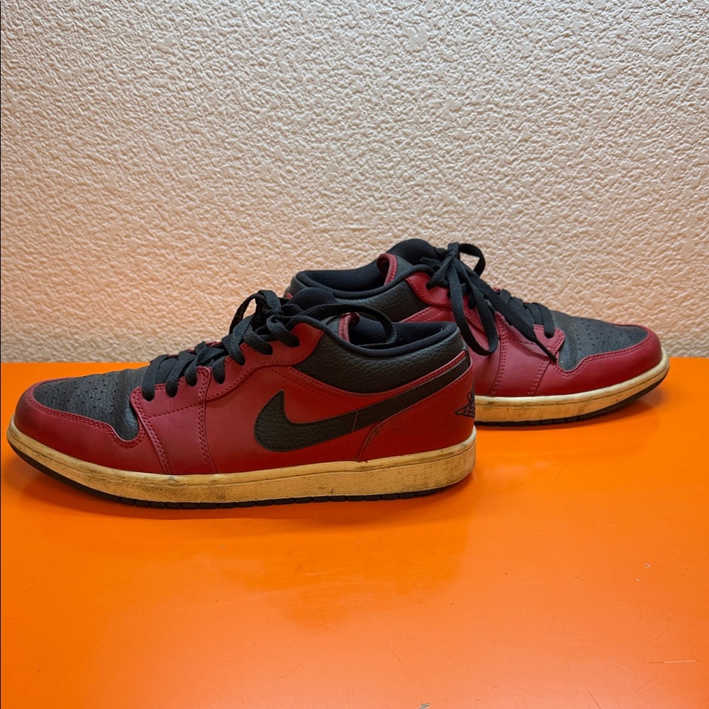 Nike AJ1 Low Air Jordan Men's Black and Red Sneakers